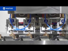 Машина для наполнения и укупорки водного крема, розлив, сальникование и завинчивание.